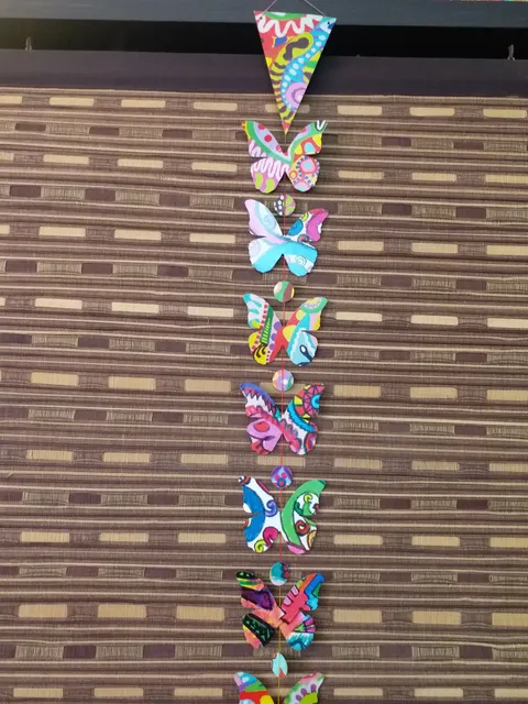 BRIGHT COLOR BUTTERFLY SHAPED BUNTING WITH TASSEL 1