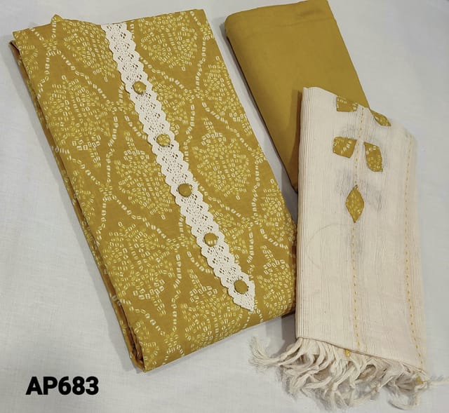 CODE AP683 : Bandhini Printed Mehandhi Yellow soft Silk Cotton unstitched Salwar material(requires lining) with lace work and buttons on yoke, matching thin soft cotton bottom, applique work on sillk cotton dupatta with tassels.