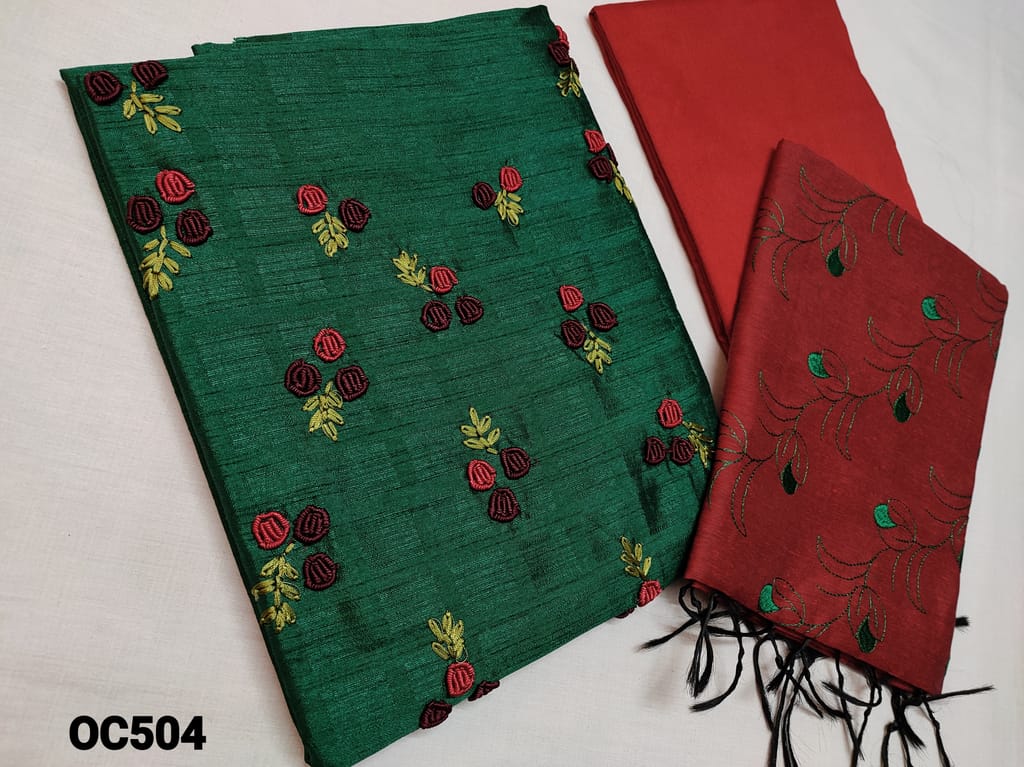 CODE OC504 : Designer Green Jakard Silk Cotton unstitched salwar material(coarse fabric, requires lining) with Thread Embroidery work on yoke, Red santoon or silk cotton bottom, embroidery work on Silk cotton dupata with tassels