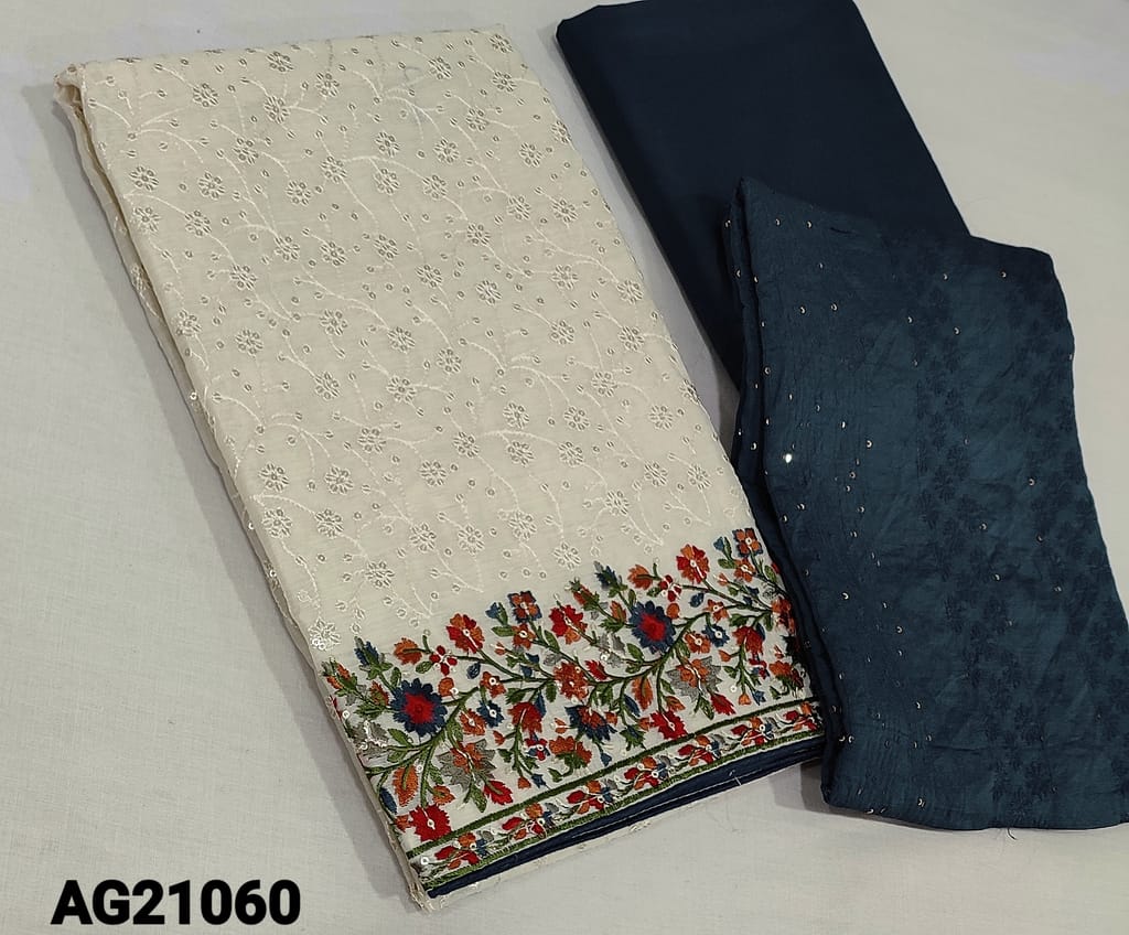 CODE AG21060 : Premium Ivory Silk Cotton unstitched salwar material(requires lining) with thread and sequence work on frontside, colorful embroidery work on daman, teal blue cotton bottom, thread and sequence work on jakard silk cotton dupatta(requires taping)