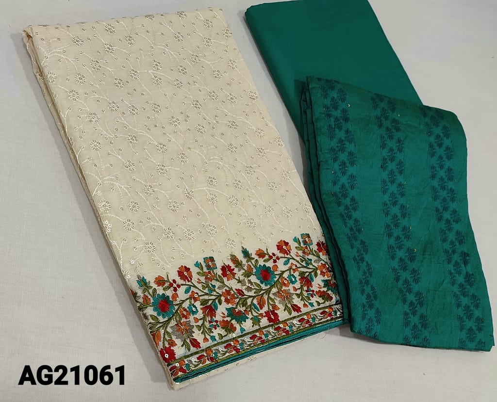 CODE AG21061 : Premium Ivory Silk Cotton unstitched salwar material(requires lining) with thread and sequence work on frontside, colorful embroidery work on daman, turquoise green cotton bottom, thread and sequence work on jakard silk cotton dupatta(requires taping)