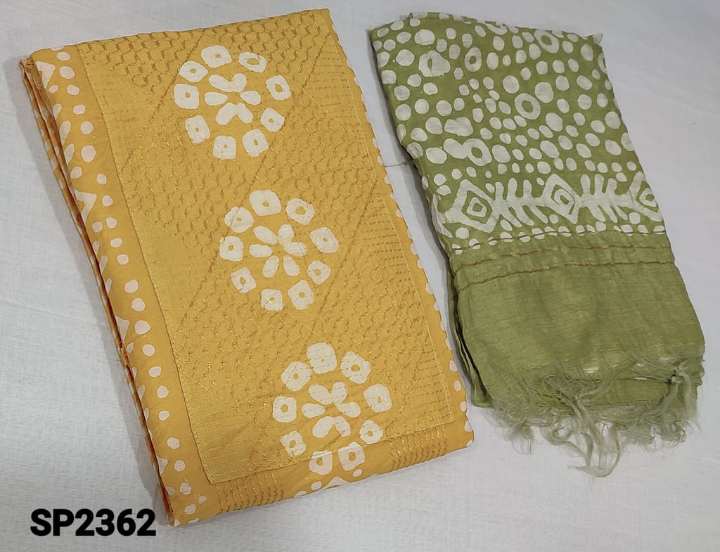 CODE SP2363 :Batik Dyed Yellow Soft Silk Cotton unstitched dress material(lining included) with thread and sequence work on yoke, matching lining provided, NO BOTTOM,  batik dyed soft silk cotton dupatta(requires tapings)