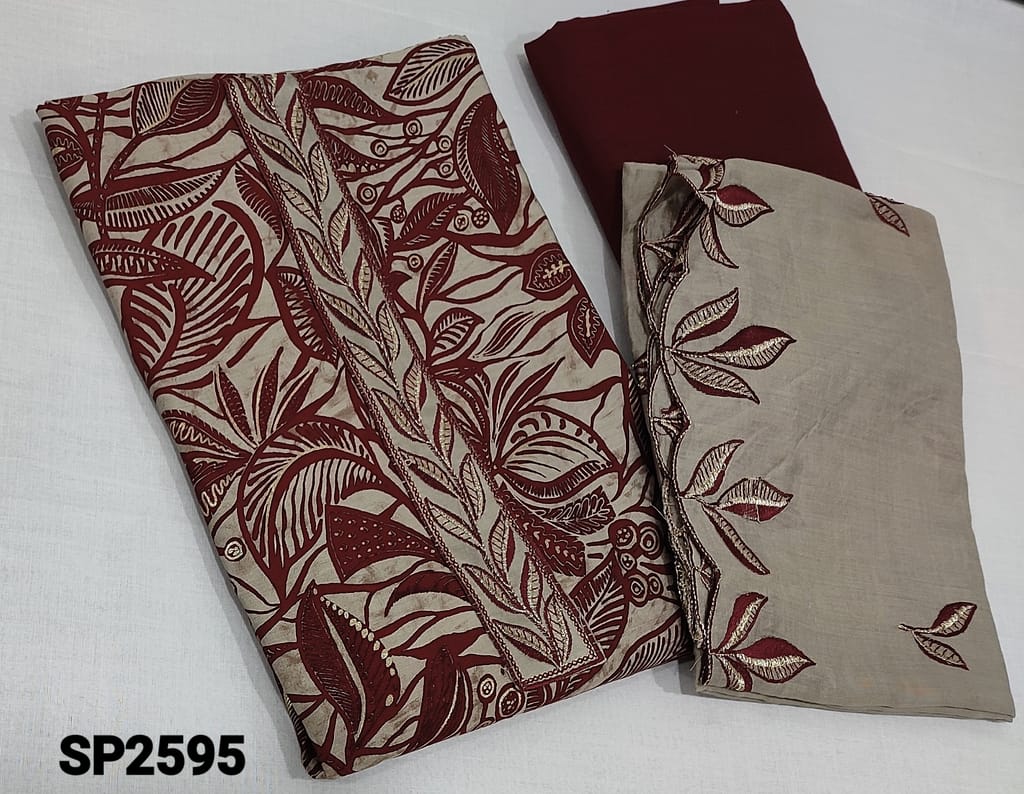 CODE SP2595: Printed Maroon Viscous Silk unstitched Salwar material(requires lining) with thread and sequence work on yoke, matching cotton bottom, embroidery work on silk cotton dupatta with embroidery cut work edges and tapings.