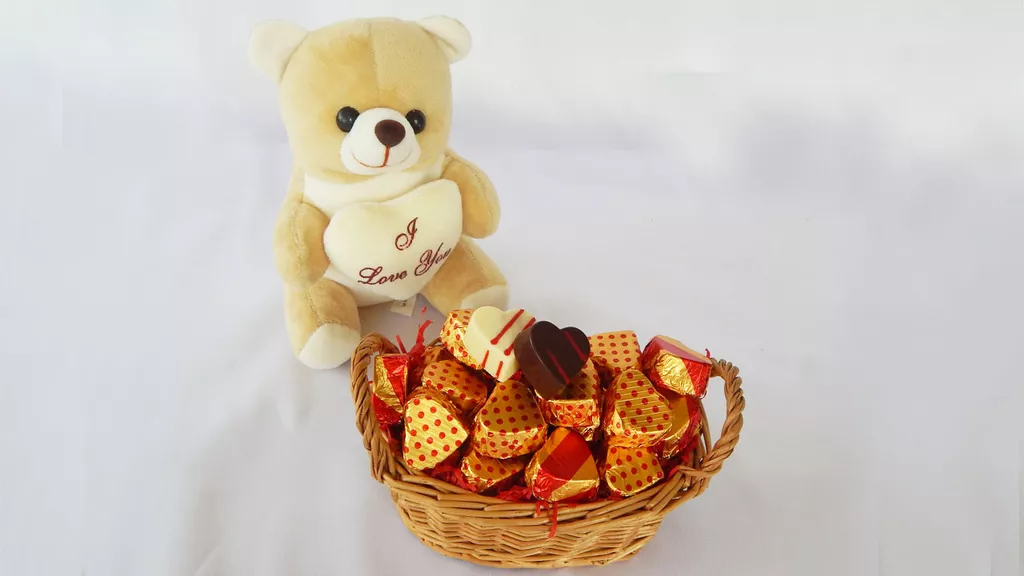 Cute Teddy With Chocolates For Your Love