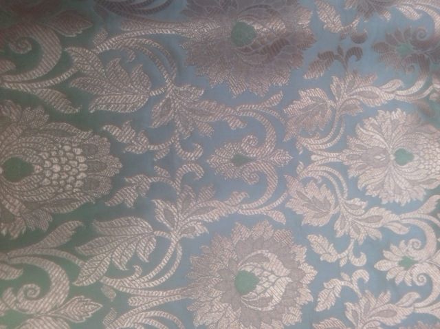Regal and fancy floral work fine feel rich grand look refined stylish flare festive and high-class opulent presented floral weave fabric