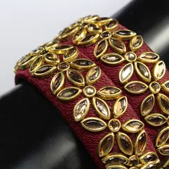 Kundan style clean prong encasing thread bound base floral majestic twin set bangles