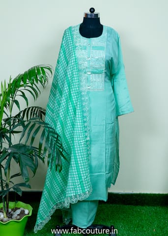 Green Muslin Emnroidered Suit With Cotton Bottom And Muslin Scallop Dupatta