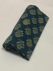 Blue colored fabric with golden fowers print