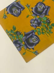 Mustard yellow cotton fabric with blue flowers print