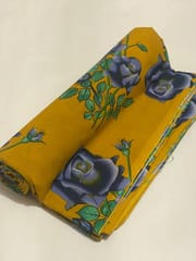 Mustard yellow cotton fabric with blue flowers print