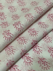 White colored cotton fabric with red design print