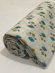 White colored cotton  fabric with small blue tulips print