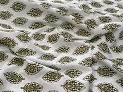 white base fabric with leaves