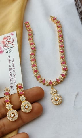 Pink with gold diamond