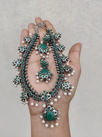 Green oxidised guttapusulu