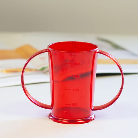 Red 2 handled beaker on a table.