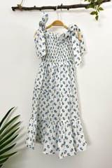 Little white dress with smocking and tie-up shoulders