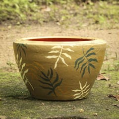 Shivering leaves on army green apple planter