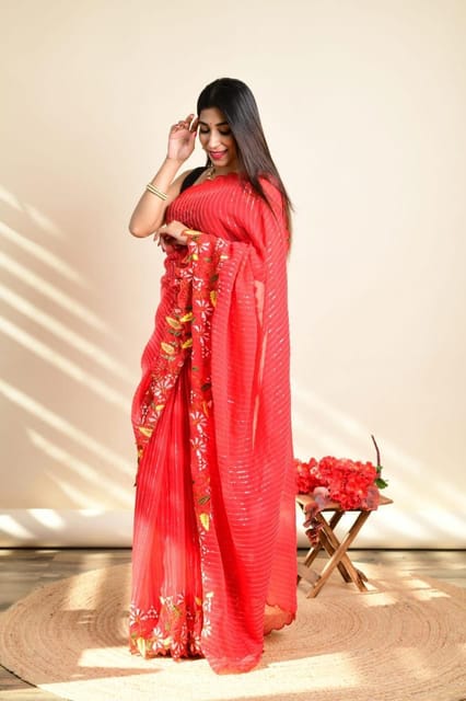 Beautiful Georgette Saree in Tomato Red with all over Sequence work and Cutwork Embroidery at the border.