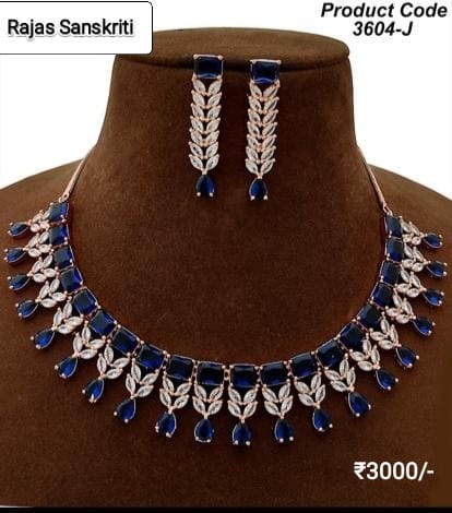 Elegant and Smart American Diamond and Blue Stone Necklace Set studded in Rose Gold