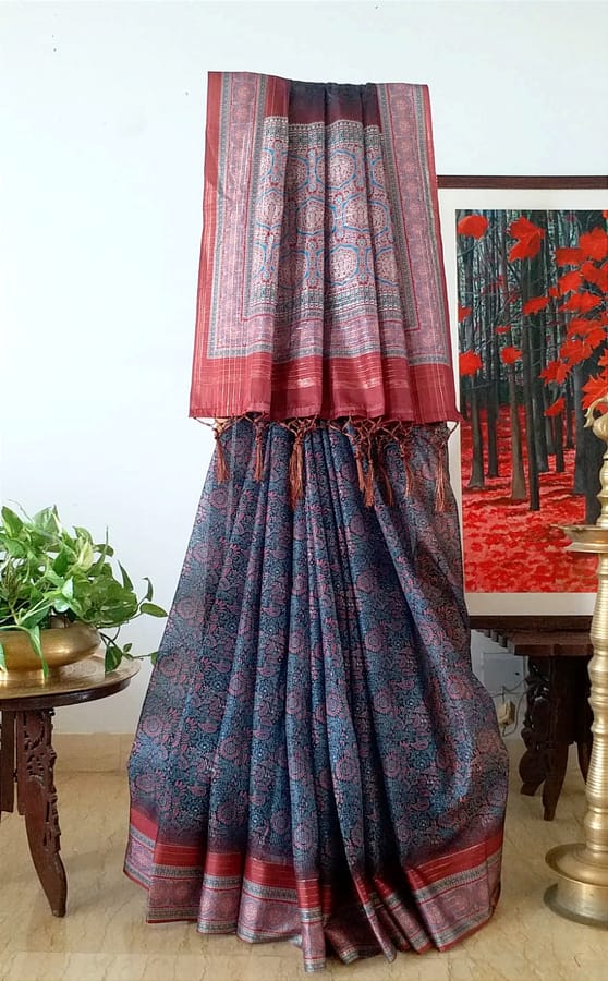 Blue,Maroonish Red, and Black Ajrakh Print Pure Kota saree with light zari lining in the border and aanchal