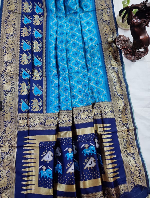 Beautiful Patola Silk Saree in Firoza Blue and Navy Blue with Golden Zari Work