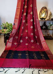 Banarasi Raw Silk Saree In Maroonish Cherry Red with Orange Border & Contrast Black Anchal with Zari Work