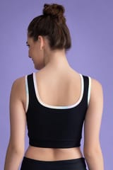 Clovia Medium Impact Padded Non-Wired Sports Bra with Removable Cups in Black - Quick-Dry