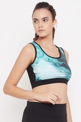 Clovia Medium Impact Padded Marble Print T-shirt Sports Bra in Blue - Moisture Wicking