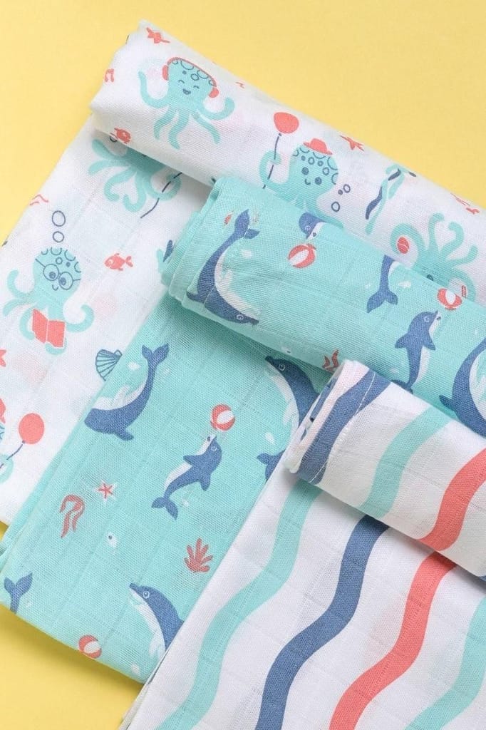 Kaarpas Ocean Dive organic muslin cotton swaddle 3 pack: Dolphin, Octopus and Dreamy Waves