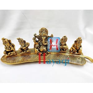 Musical Ganesh Sitting On Leaf Statue Golden Finish Online